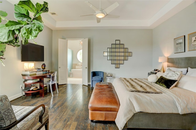 5007 Dickson St, Houston, TX 77007 - bedroom featuring a raised ceiling, wood finished floors, connected bathroom, and ceiling fan
