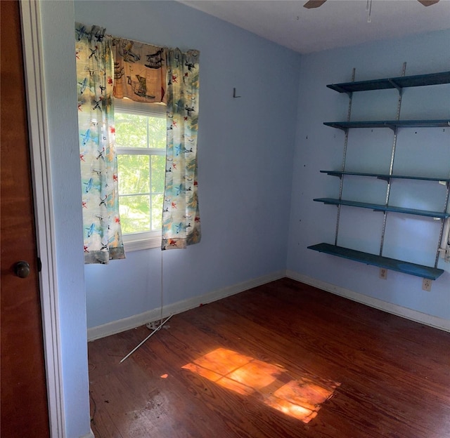 3120 Cemetery Rd, Santa Fe, TX 77517 - spare room featuring wood finished floors and a ceiling fan