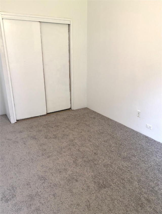 103 Greenbriar Dr, Wharton, TX 77488 - unfurnished bedroom featuring carpet and a closet