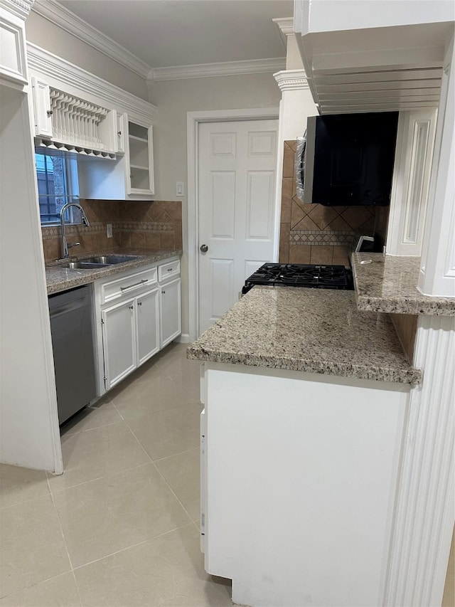 1307 Rim Rock Dr, Houston, TX 77088 - kitchen with stainless steel dishwasher, light tile patterned flooring, white cabinetry, backsplash, and ornamental molding