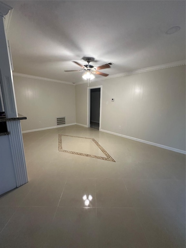 1307 Rim Rock Dr, Houston, TX 77088 - spare room with ceiling fan, crown molding, and light tile patterned floors