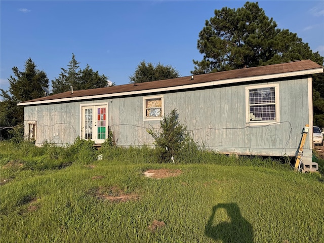 21269 Bracewell Rd, Bedias, TX 77831 - view of front of home with french doors