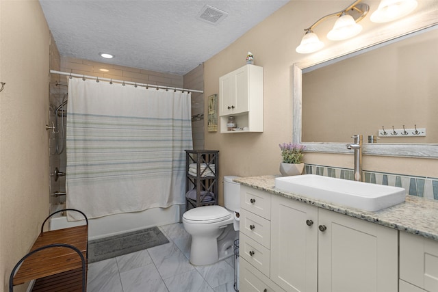 3926 Lavender St, Houston, TX 77026 - bathroom with vanity, shower / tub combo with curtain, marble finish floors, and a textured ceiling