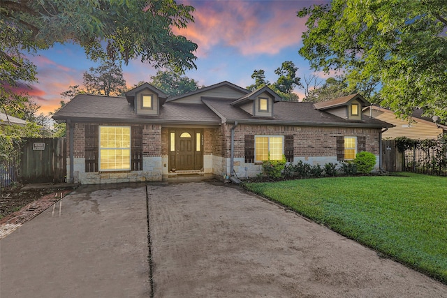 3926 Lavender St, Houston, TX 77026 - traditional home with brick siding, stone siding, and roof with shingles