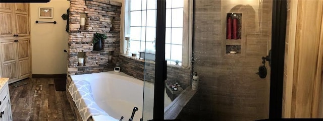 20726 Redbud Trl, Humble, TX 77346 - full bathroom with a bath and wood finished floors