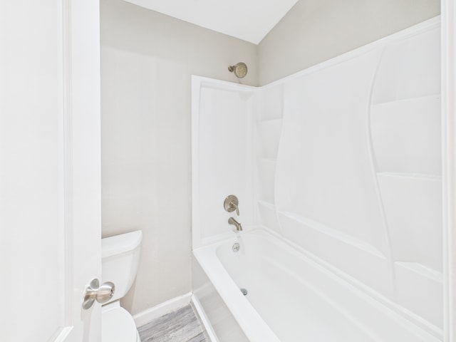 8055 Cambridge St Unit 26, Houston, TX 77054 - full bath featuring washtub / shower combination and wood finished floors