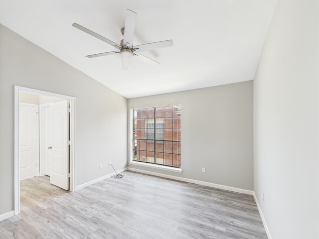 8055 Cambridge St Unit 26, Houston, TX 77054 - spare room featuring lofted ceiling, light wood-style flooring, and ceiling fan