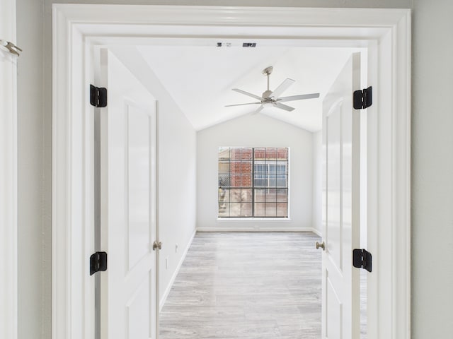 8055 Cambridge St Unit 26, Houston, TX 77054 - spare room featuring a ceiling fan, light wood finished floors, and lofted ceiling