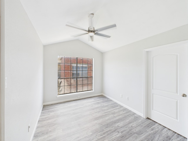 8055 Cambridge St Unit 26, Houston, TX 77054 - empty room with ceiling fan, wood finished floors, and lofted ceiling