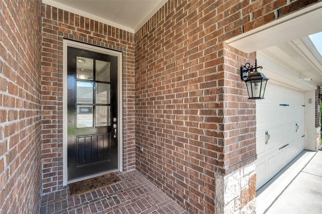 3053 Peterson Cir, Bryan, TX 77802 - property entrance with brick siding and a garage