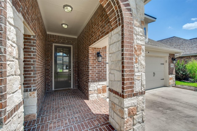 3053 Peterson Cir, Bryan, TX 77802 - doorway to property featuring brick siding, driveway, and roof with shingles