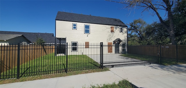 4209 Tampico Rd, Houston, TX 77016 - rear view of property with a fenced front yard and a gate