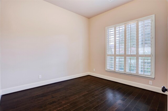 4023 Turning Manor Ln, Sugar Land, TX 77479 - empty room featuring healthy amount of natural light and dark wood finished floors