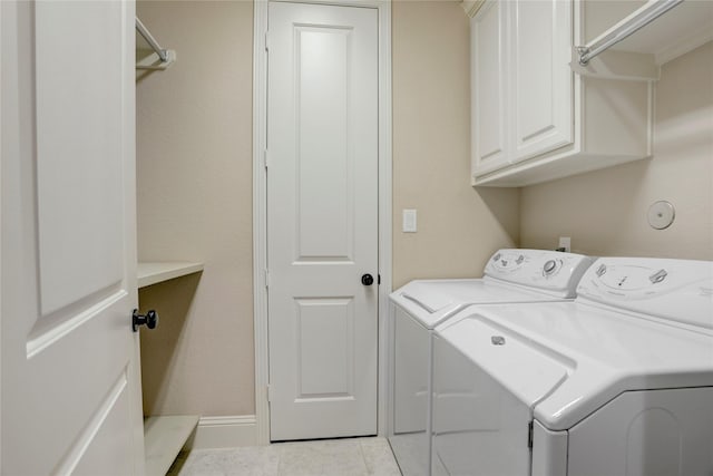 4023 Turning Manor Ln, Sugar Land, TX 77479 - washroom featuring independent washer and dryer, cabinet space, and tile patterned flooring