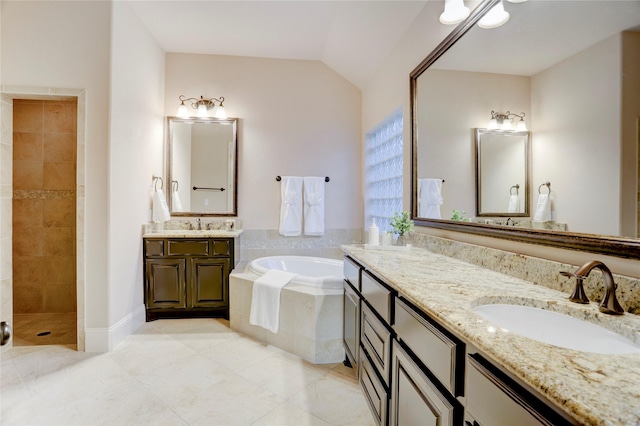 4023 Turning Manor Ln, Sugar Land, TX 77479 - full bath with a bath, tile patterned flooring, two vanities, a tile shower, and lofted ceiling