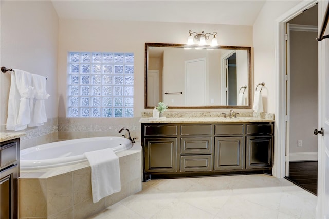 4023 Turning Manor Ln, Sugar Land, TX 77479 - bathroom featuring vanity and a bath