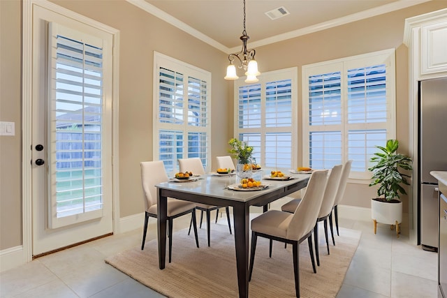 4023 Turning Manor Ln, Sugar Land, TX 77479 - dining area featuring a chandelier, light tile patterned flooring, plenty of natural light, and crown molding