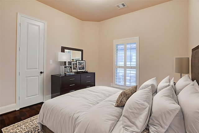 4023 Turning Manor Ln, Sugar Land, TX 77479 - bedroom featuring dark wood-style floors and baseboards