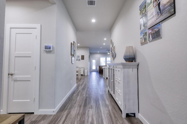 10026 Angelina Woods Ln, Conroe, TX 77384 - corridor featuring dark wood-type flooring and recessed lighting