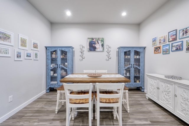 10026 Angelina Woods Ln, Conroe, TX 77384 - dining area featuring wood finished floors and recessed lighting