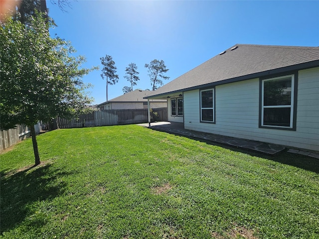 10026 Angelina Woods Ln, Conroe, TX 77384 - fenced backyard with a patio