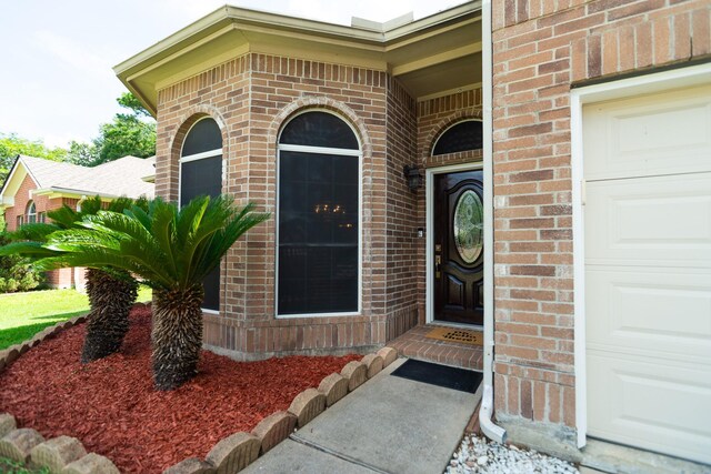22110 Nobles Crossing Dr, Spring, TX 77373 - entrance to property featuring brick siding and a garage