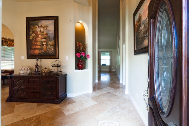 22110 Nobles Crossing Dr, Spring, TX 77373 - entryway featuring arched walkways and light tile patterned floors