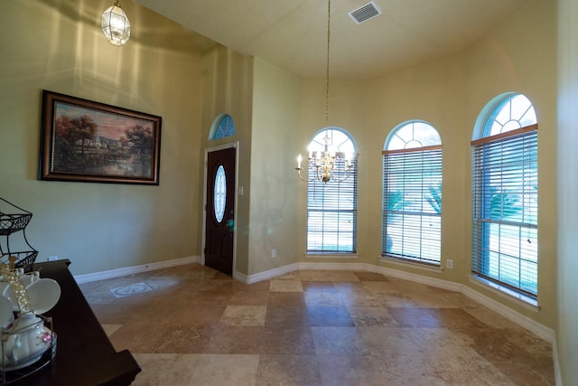 22110 Nobles Crossing Dr, Spring, TX 77373 - foyer with a chandelier and a towering ceiling
