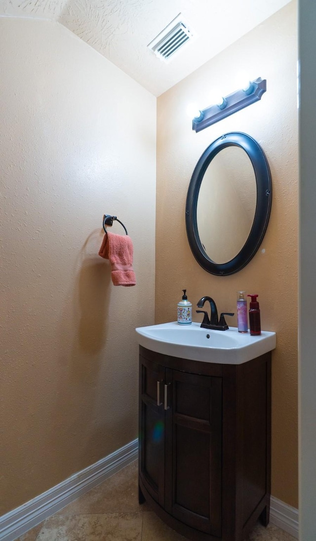 22110 Nobles Crossing Dr, Spring, TX 77373 - bathroom featuring vanity, vaulted ceiling, and tile patterned flooring