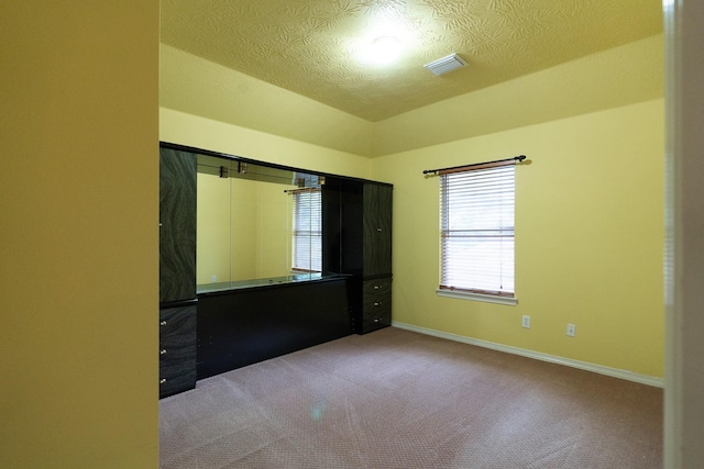 22110 Nobles Crossing Dr, Spring, TX 77373 - carpeted empty room featuring baseboards and vaulted ceiling