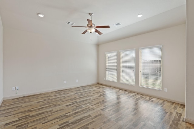 5207 Corbridge Glen Ct, Katy, TX 77449 - spare room featuring wood finished floors, a ceiling fan, and recessed lighting
