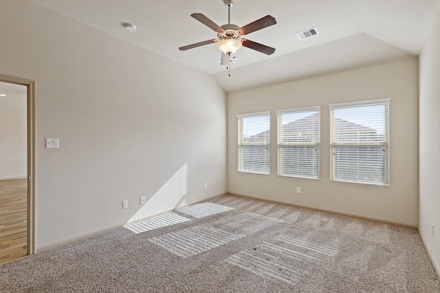 5207 Corbridge Glen Ct, Katy, TX 77449 - spare room featuring a ceiling fan, light carpet, a smoke detector, and lofted ceiling