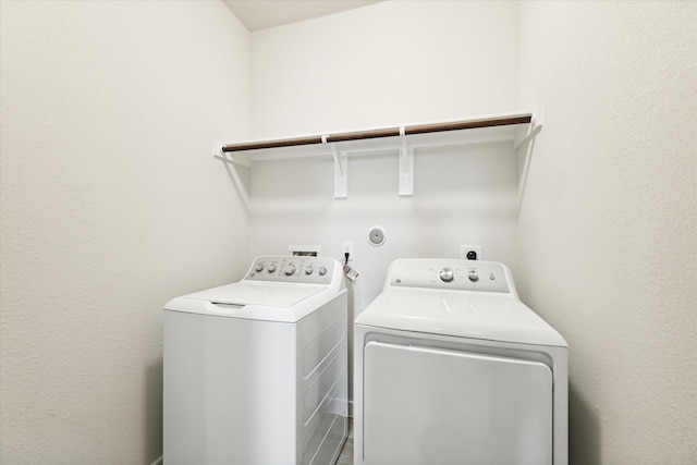 7838 Ruth Ravine Ct, Spring, TX 77379 - laundry room with independent washer and dryer