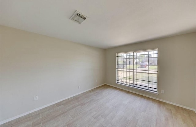 12938 S Coast Dr, Houston, TX 77047 - empty room with light wood finished floors and baseboards