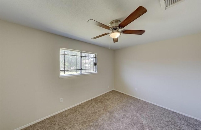 12938 S Coast Dr, Houston, TX 77047 - spare room with carpet floors and ceiling fan