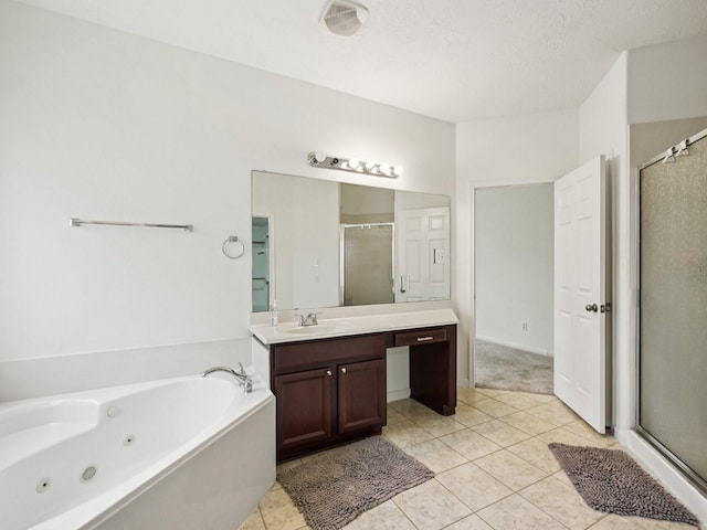421 White Oak Pointe, League City, TX 77573 - full bath featuring a shower stall, vanity, a whirlpool tub, and tile patterned flooring