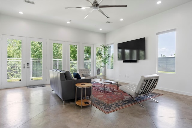 543 Threlkeld St, Houston, TX 77007 - living area featuring healthy amount of natural light, recessed lighting, french doors, and concrete flooring