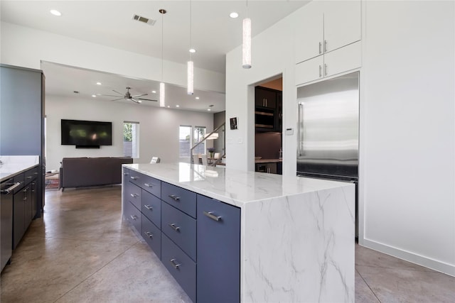 543 Threlkeld St, Houston, TX 77007 - kitchen with high end fridge, a ceiling fan, white cabinets, a kitchen island, and open floor plan