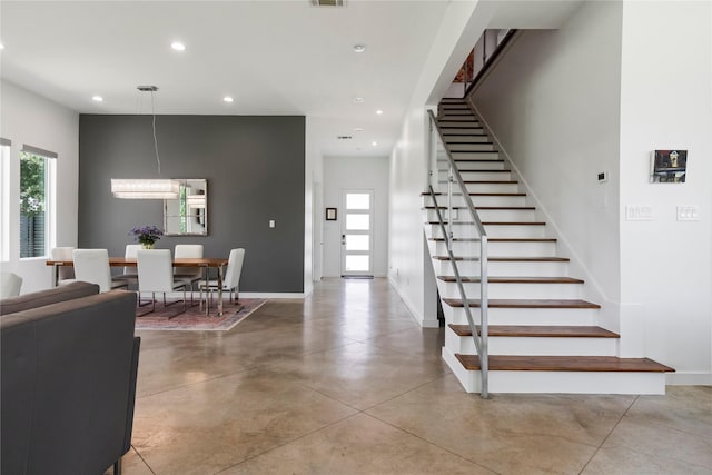 543 Threlkeld St, Houston, TX 77007 - staircase featuring recessed lighting and finished concrete floors