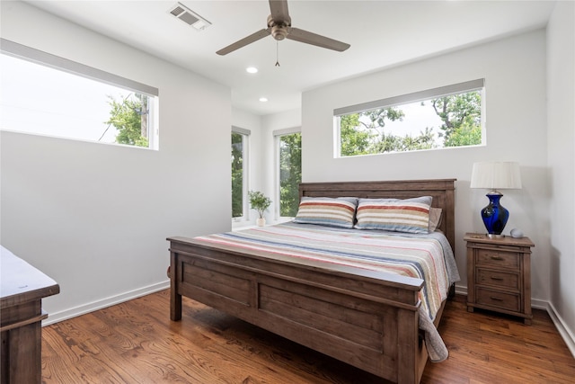 543 Threlkeld St, Houston, TX 77007 - bedroom featuring wood finished floors, recessed lighting, and a ceiling fan