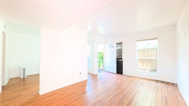 10001 Westpark Dr Unit 29, Houston, TX 77042 - unfurnished room with light wood finished floors and baseboards