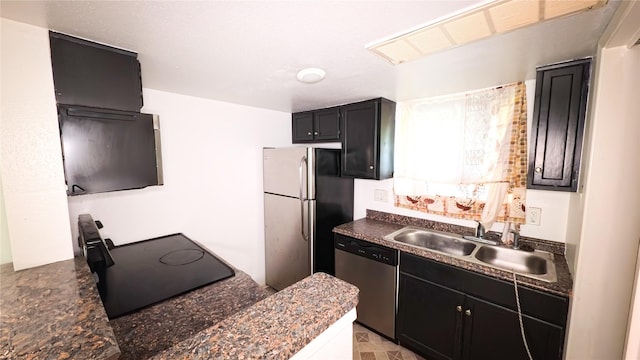 10001 Westpark Dr Unit 29, Houston, TX 77042 - kitchen with stainless steel dishwasher, freestanding refrigerator, dark countertops, dark cabinetry, and stove