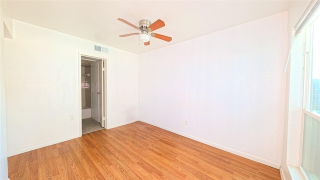 10001 Westpark Dr Unit 29, Houston, TX 77042 - spare room with a ceiling fan and light wood-style floors