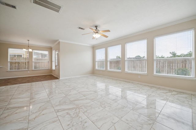 2439 Chuckberry St, Houston, TX 77080 - spare room featuring plenty of natural light, marble look tile flooring, ornamental molding, a chandelier, and ceiling fan