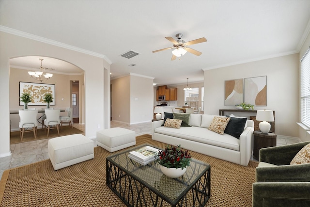 2439 Chuckberry St, Houston, TX 77080 - living area with arched walkways, a chandelier, ornamental molding, light marble finish floors, and a ceiling fan