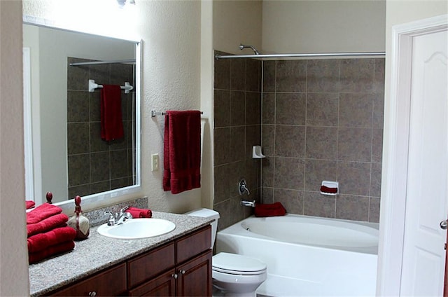 1711 Old Spanish Trl Unit 343, Houston, TX 77054 - bathroom featuring vanity, tub / shower combination, and a textured wall