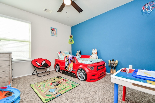 5502 Peralta Mills Way, Katy, TX 77449 - carpeted bedroom with baseboards and a ceiling fan