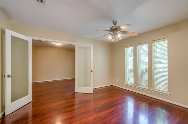 15622 Sunset Rock Dr, Houston, TX 77084 - spare room featuring french doors, ceiling fan, and wood finished floors
