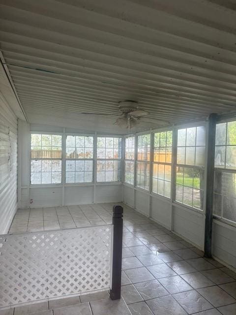 1120 W Robinson St, Alvin, TX 77511 - unfurnished sunroom with a ceiling fan