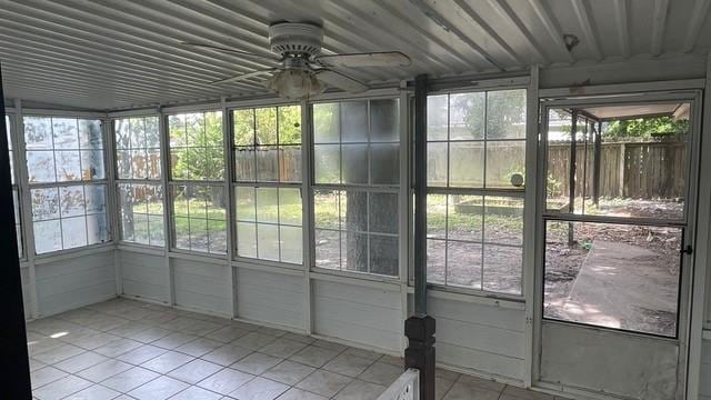 1120 W Robinson St, Alvin, TX 77511 - unfurnished sunroom featuring ceiling fan and healthy amount of natural light